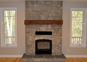A stunning stone fireplace with