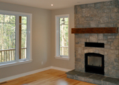 Large windows, a stone fireplace